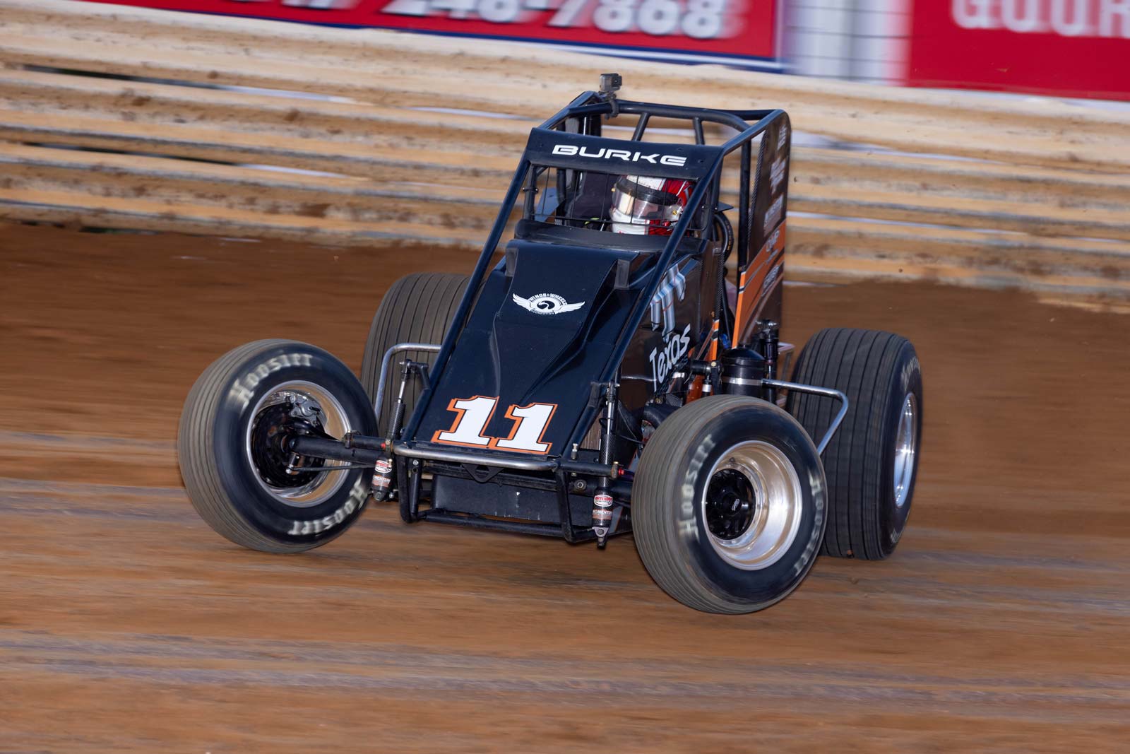 Trey Burke driving dirt track racer