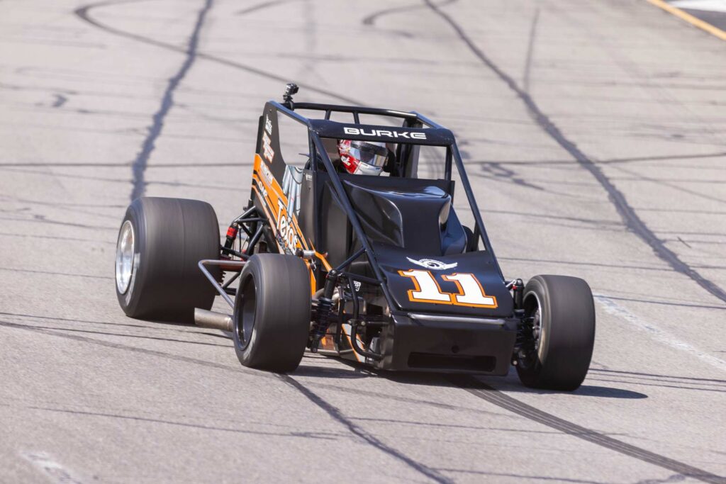 Trey Burke driving dirt track racer